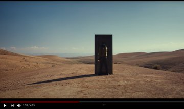 The various shots of him alternate and one of them is his walk towards this door. It almost drags on, building suspense of what the door is, and what lies behind. *AT 1:32*, he opens the door. If the Wall is a metaphor for hiding, him opening the Door is him showing us the truth.