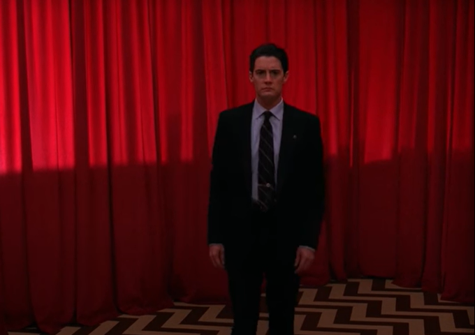 Beyond the door is a room with high red curtains and black and white alternating floors, which is a reference to the Red room from Twin Peaks, also called THE WAITING ROOM. It's supposed to be "the Black Lodge, an evil place all souls pass through on the way to perfection."