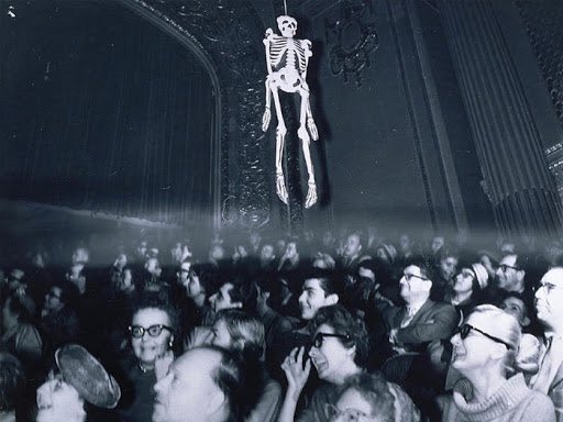 William Castle was king of gimmicks, so when the skeleton emerges at the end of  #houseonhauntedhill in the theatre a fake skeleton on a wire was suspended over the audience. It elicited more laughter than screams and folks threw candy & popcorn at it.  #TCMParty