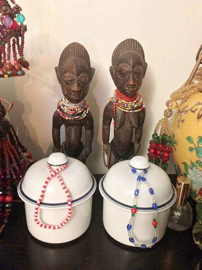 Once the figure is brought to the family dwelling, it is placed on a shrine dedicated to Elegba with the hope that the Orisha or soul, which was split in two parts when the twins were born, will now again reside in the figure that represents the dead twin.
