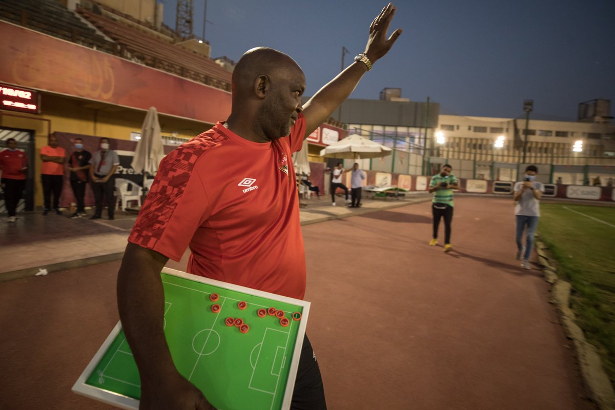 Soccer_Laduma's tweet photo. Pitso Mosimane had his first day of work and guided his first training session at Al Ahly on Friday. Find all the behind the scenes footage here! https://t.co/TjUXq116as https://t.co/PFxh57bmuX