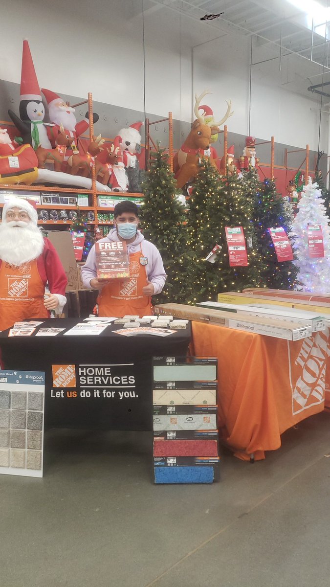 Yovany B manning the carpet and flooring event running today. It's Santa approved! <a href="/ZachBoonTHD/">Zach Boon</a>