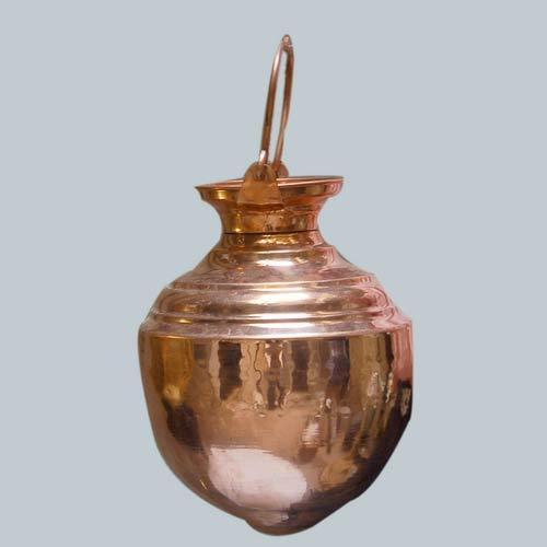 Lord Shiva is very fond of Abhishek. To make a continuous abhishek on the Shiv Ling, they put a copper pot which a very small hole at the bottom. This way water's abhishek runs for long period of time. Some people also put milk in it.