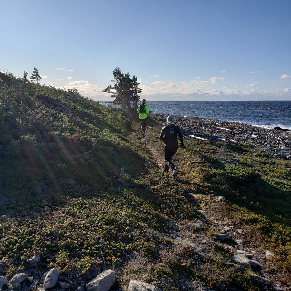 Jessica Dahn  and Shaun MacLean are running the Labrador Pioneer Footpath #FKTPioneerFootpath today, Saturday, October 10. We caught them on the trail between English Point and L' Anse Amour.

#explorenl
#labradorpioneerfootpath
@TheGreatTrail @LabradorTweets @NLtweets
