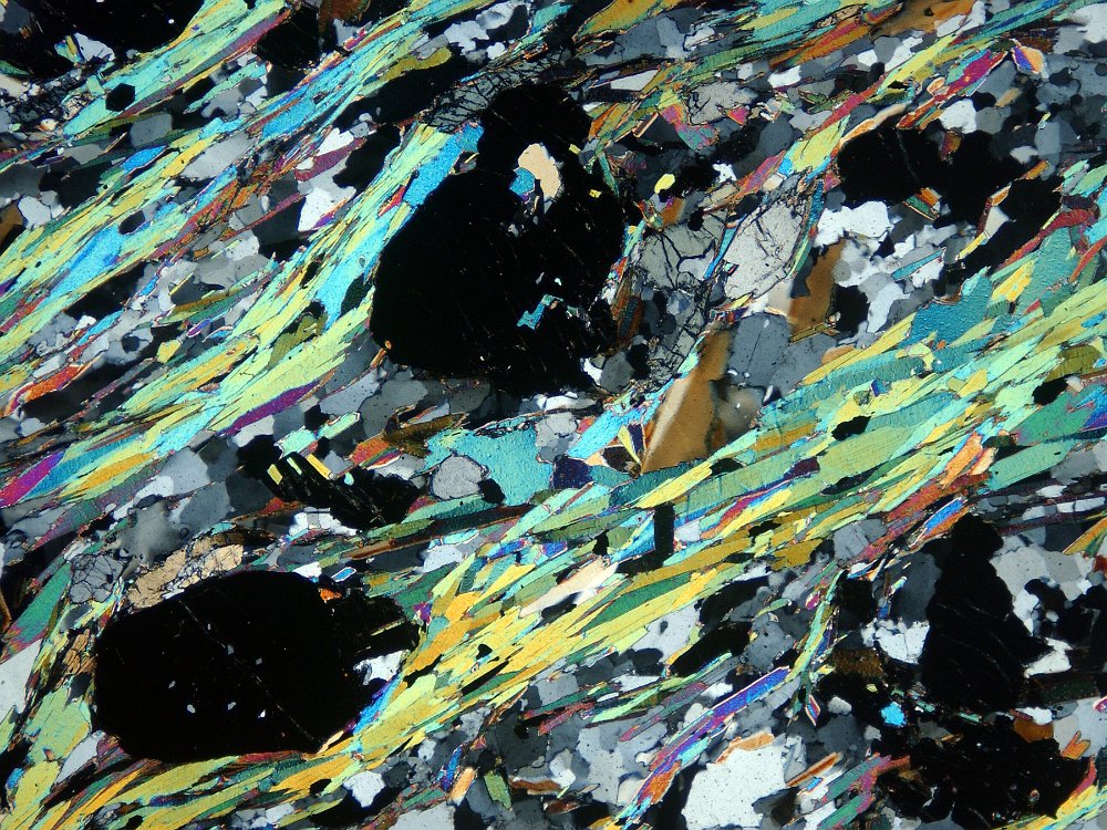 Day 3 of  #Rocktober -  #Microscopic I have nothing personal to share as I don't have the tools for microscopic geology, so here are some pics from  https://www.earth.ox.ac.uk/~oesis/micro/  showing how beautiful rocks are when you look really close.FeldsparGarnet Mica SchistOlivine GabbroCoal