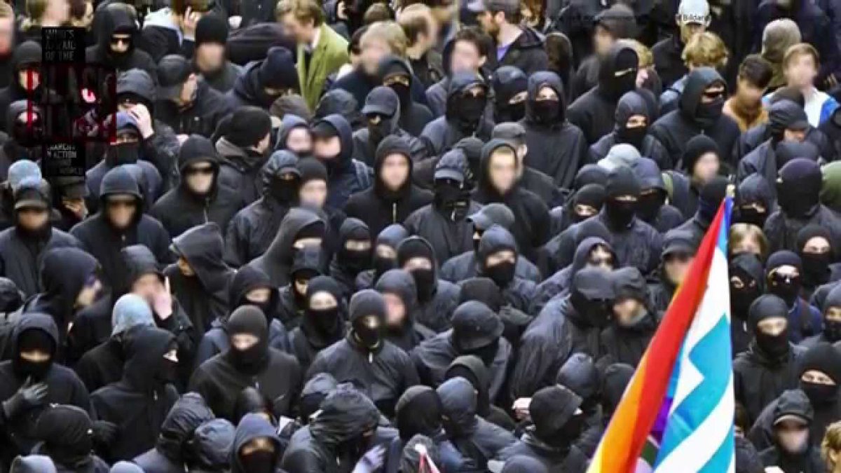 Black Bloc: This is a specific protest tactic of wearing all black clothing so that no single individual can easily be singled out by the state or right-wing. It also includes protective gear at times. We do not typically wear this while traveling by plane.