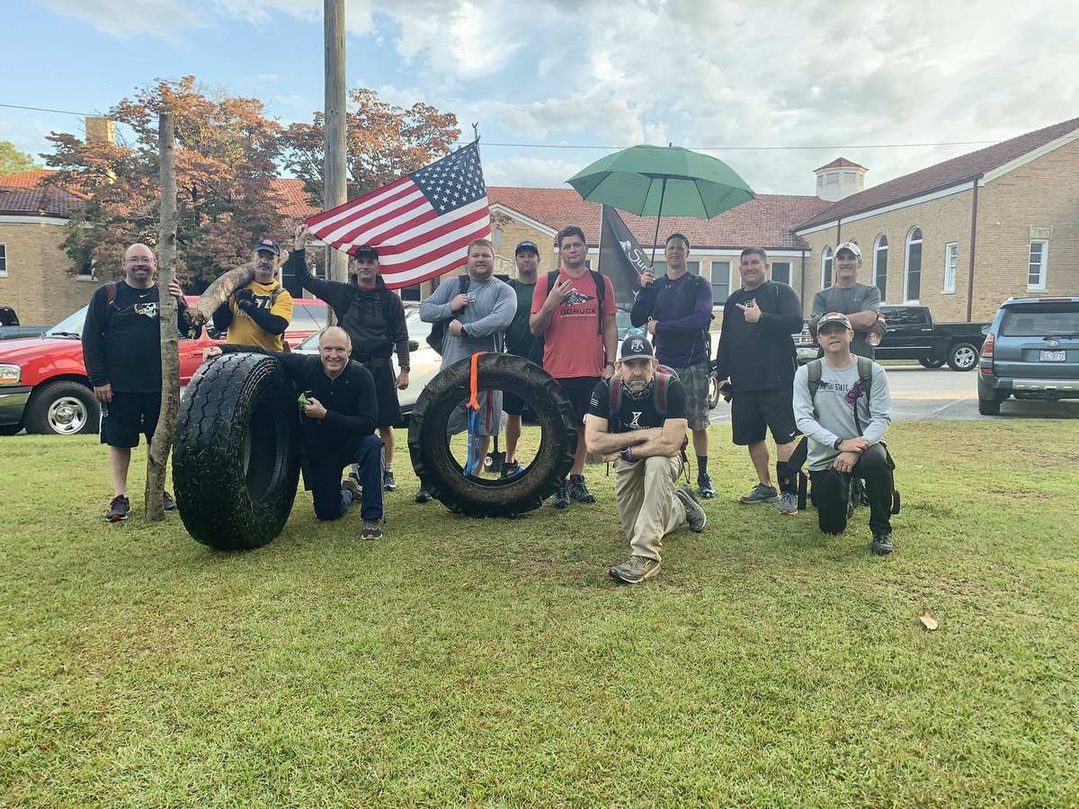 F3Poppins's tweet photo. @F3ENC Poppins threatened to cane the 11 brave men who flipped and pulled tires and carried logs at #116 with umbrella.  Men got competitive and dang there was some mumble chatter!  F3 brotherhood makes us all stronger!  Awesome push by all! https://t.co/k82IqdlXeZ