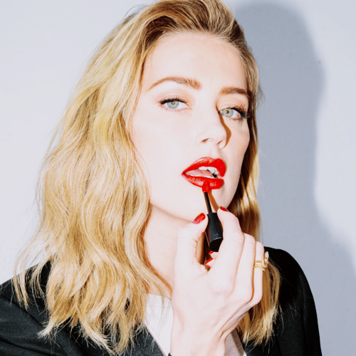 Her secret weapon: ''my matte red lipstick. I carry it in the side pocket of my purse.''