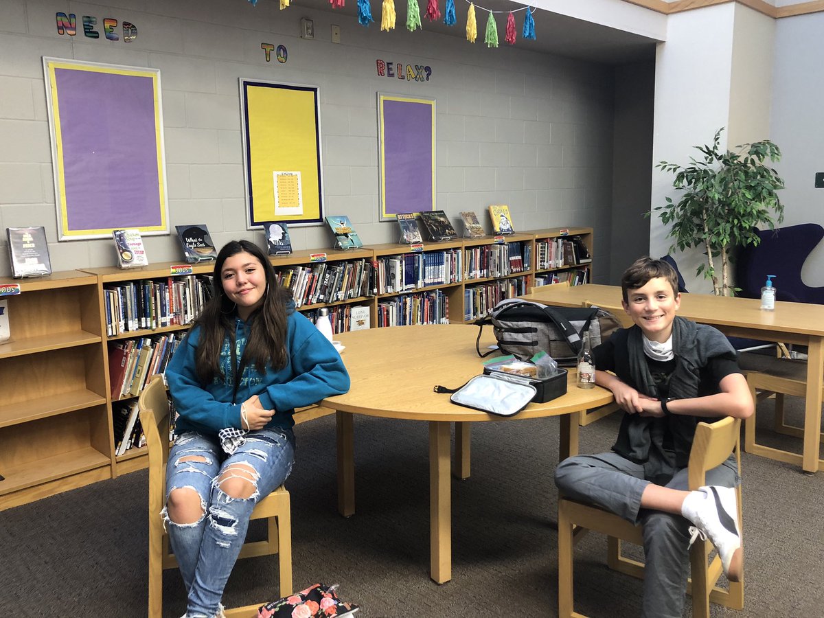 Emory and Maverick kicked back in the library during C lunch. Maverick earned a panther paw and chose the library as his reward! Love having kids in here! #lunchinthelibrary <a href="/LH_JrHigh/">LHJH</a>