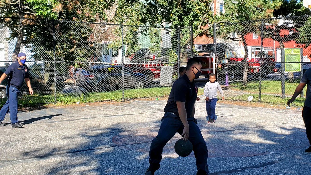 BCFDL734's tweet photo. On this B-E-A-utiful day in Baltimore, our members are out and about in the community. In between emergency calls, the members of #BCFDT23 joined a pick up game at Traci Adkins Park in the #MountClare neighborhood. https://t.co/s0BWgwpoXN