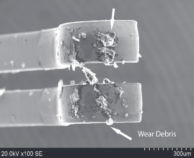 This, in turn, resulted in abrasive debris accumulating on the brush tips, and corresponding wear patterns on the flexible circuits tasked with sending electric signals to the controllers' motherboards — potentially a source of drifting. (22/26)