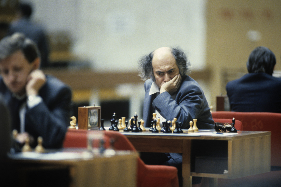 In the 2nd round of the 50th USSR Championship, Mikhail Tal is seen in play...