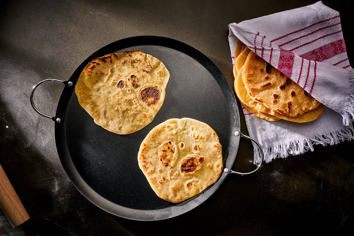 PatiJinich's tweet photo. ...sooo many kinds of flour tortillas in Sonora. Fell in love with these chubby flour Tortillas Gorditas — thicker than others, made with lots of fat &amp; many times w evaporated milk, hence the "gorditas." Here’s the recipe for you to make and eat them too  https://t.co/5R2PeIQdWM https://t.co/MA4nOUcFaJ
