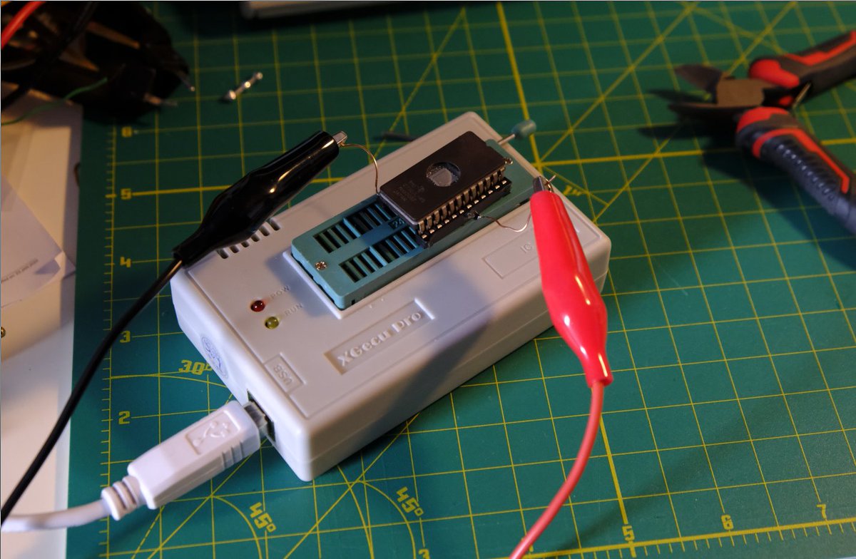 So here's what I tried to do. Since Vpp voltage doesn't have to be sent by the programmer itself, I concocted an adapter using an IC socket, leaving wires available to connect 21V and ground from another source. I hooked it up to an old Thinkpad power adapter, measuring 20.8V...