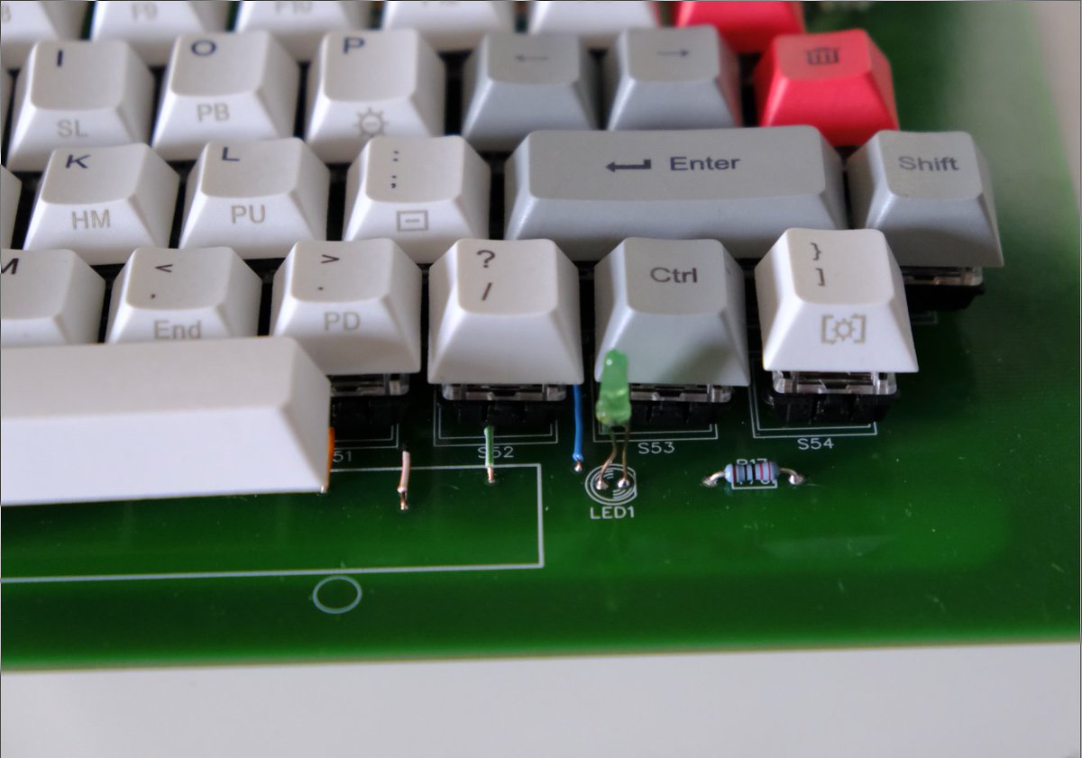 At this point I was trying get as much done before I can program the EPROMs, and I realized I couldn't find an LED that was required for power indication. Luckily, I had an old cheap keyboard controller and scavenged one green LED :)