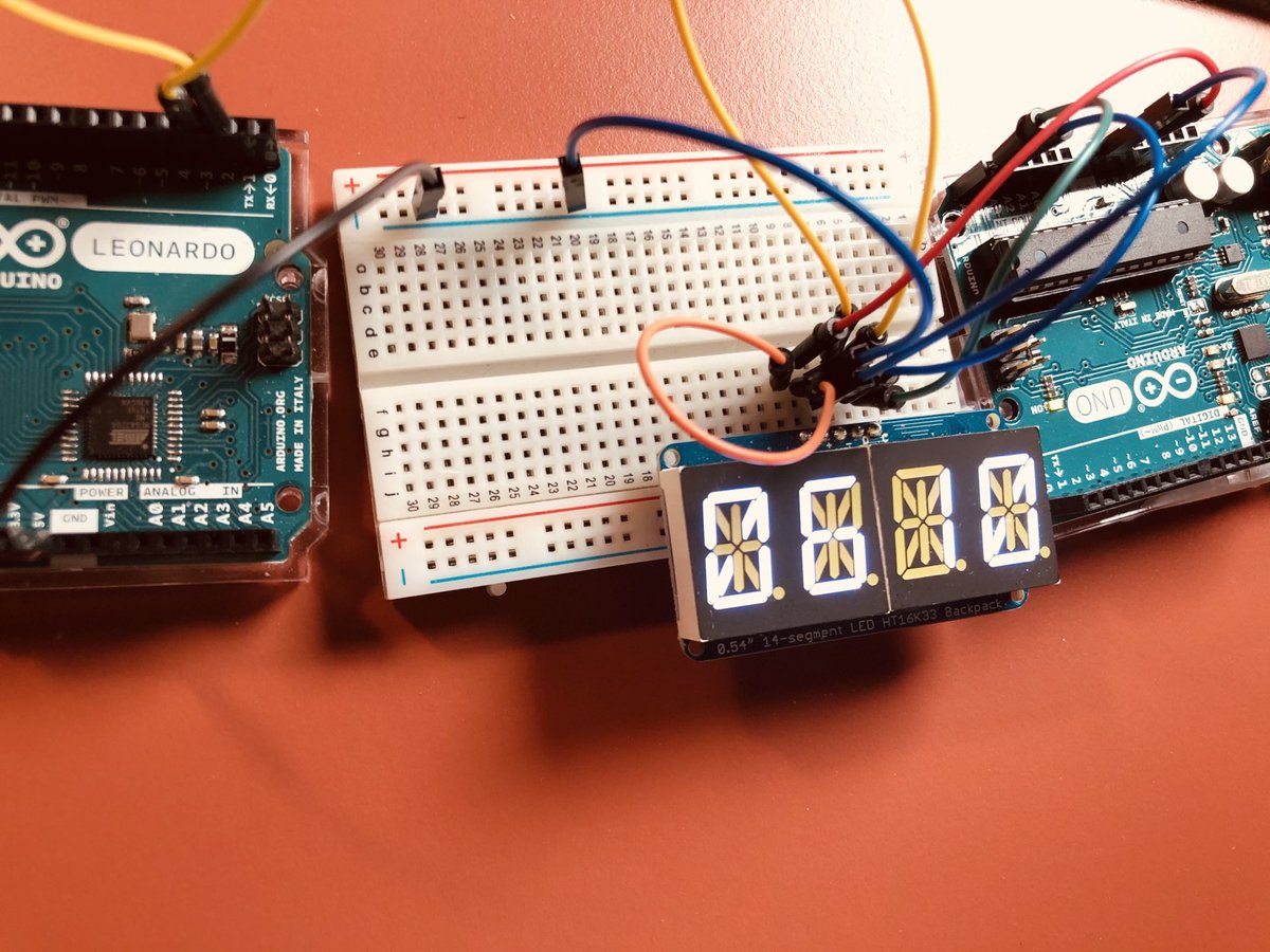 choas's tweet photo. left #Arduino counts up and right #Arduino sends data to @adafruit #AlphaNum ... all via TWI https://t.co/gQjdj1ZUVs