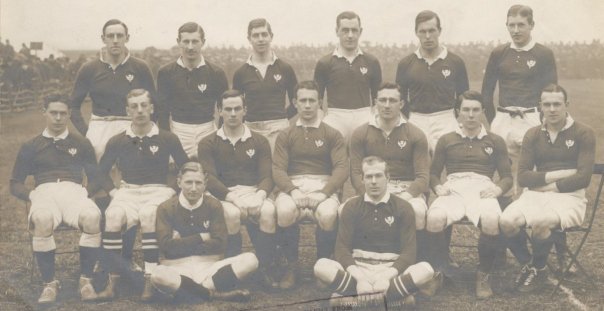 'Suddie' sitting 2nd from left, mid row. "Suddie, Suddie SutherlandThe boy with the silver hair,Englishmen and Irishmen will know when Suddie’s there."