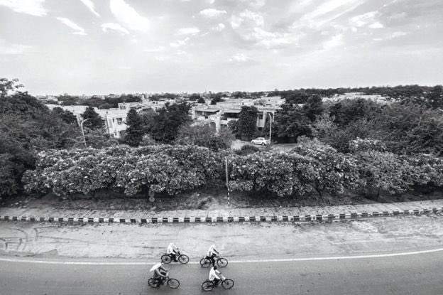 Cyclists on a highway connecting Mumbai. #Lockdown  #Covid  #Delhi 2/9