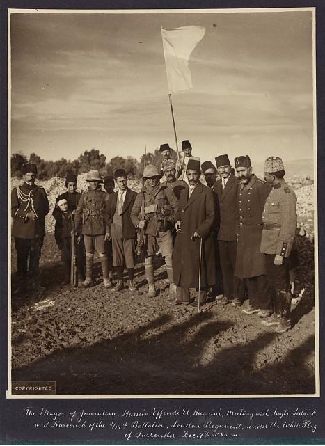 8/ As hard as it is for  @RTErdogan to fathom, here are pics of Turkey's surrender of  #Jerusalem in 1917.1: Turkish troops from area gathering in the Old City via Jaffa Gate before retreat.2: The actual surrender of the city . Turks had already bugged out.3: surrender letter.