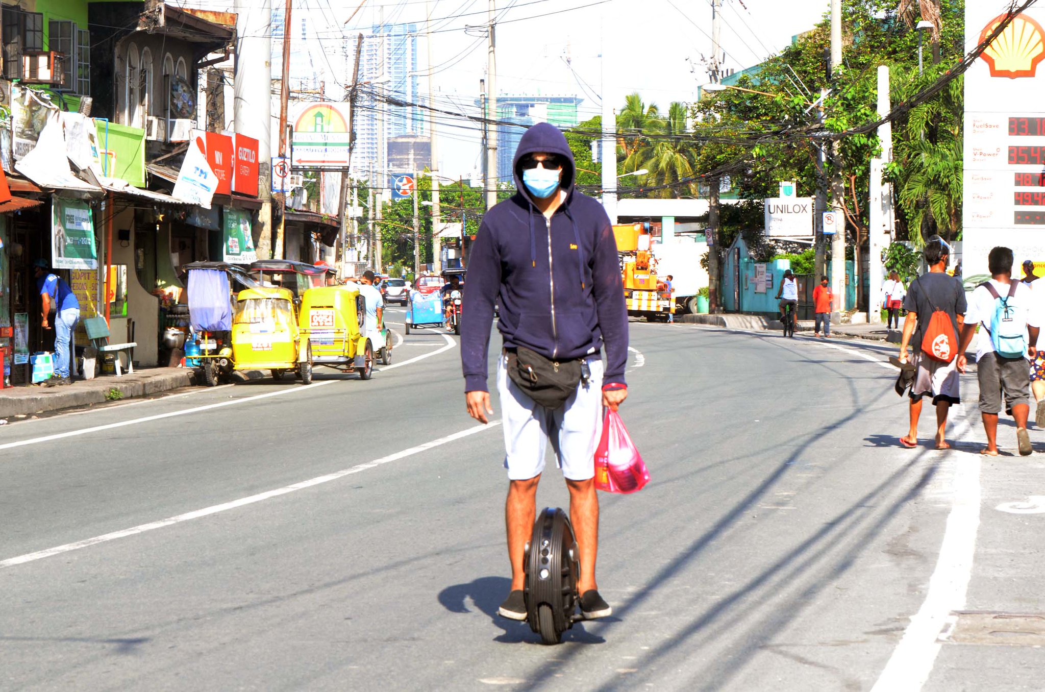 Daily Tribune on Twitter "A man travels along Pembo Avenue in Makati City using an electric