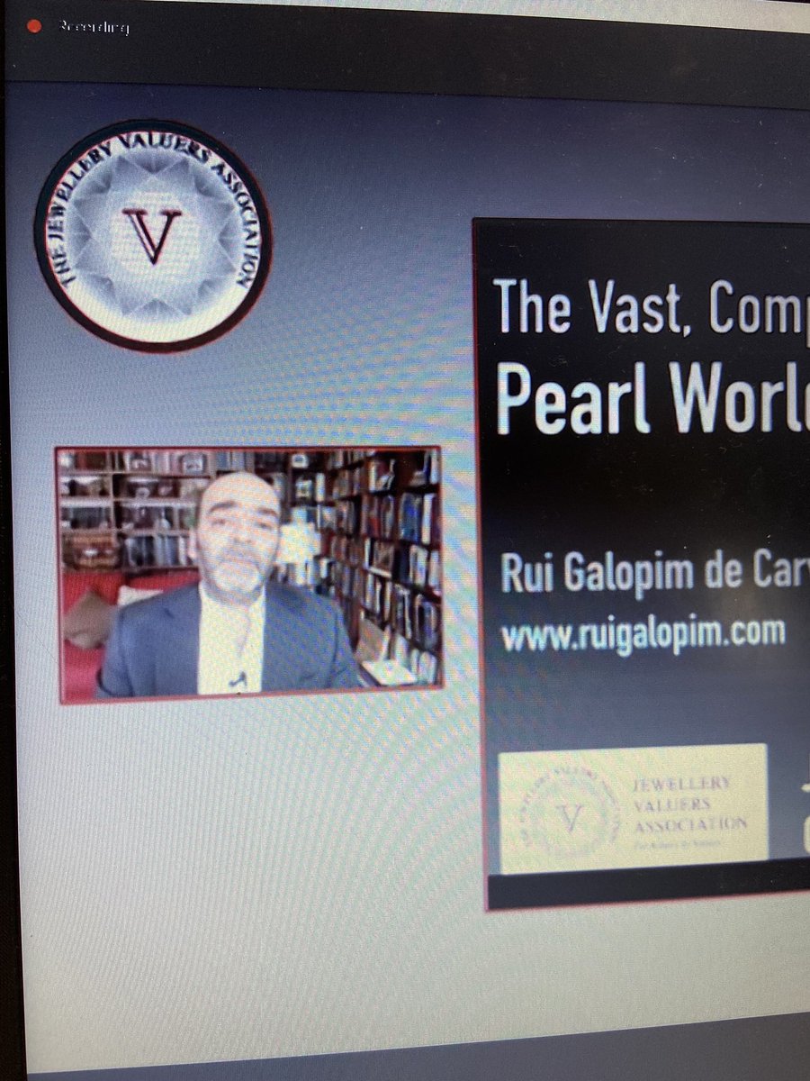 MelissaLeePat's tweet photo. Appearing in front of one of the best known bookcases in #gemmology in 2020, the very @RuiGalopim at @JewelleryValue2 #jvaconference https://t.co/IjoEcEnO6o