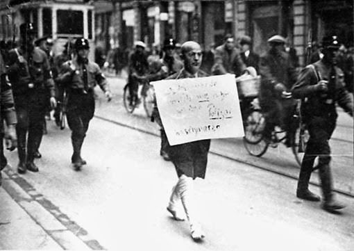 Dr Michael Siegel, an eminent German Jewish lawyer, bruised, barefoot, trousers ripped, marched down street by Nazi ‘brown-shirt’ police 10th March 1933. The sign says ‘I am a Jew, but I will never again complain to the police’.A ‘do-gooder’ lawyer.  #PritiPatel  #RuleofLaw  https://twitter.com/independent/status/1312777143340982273