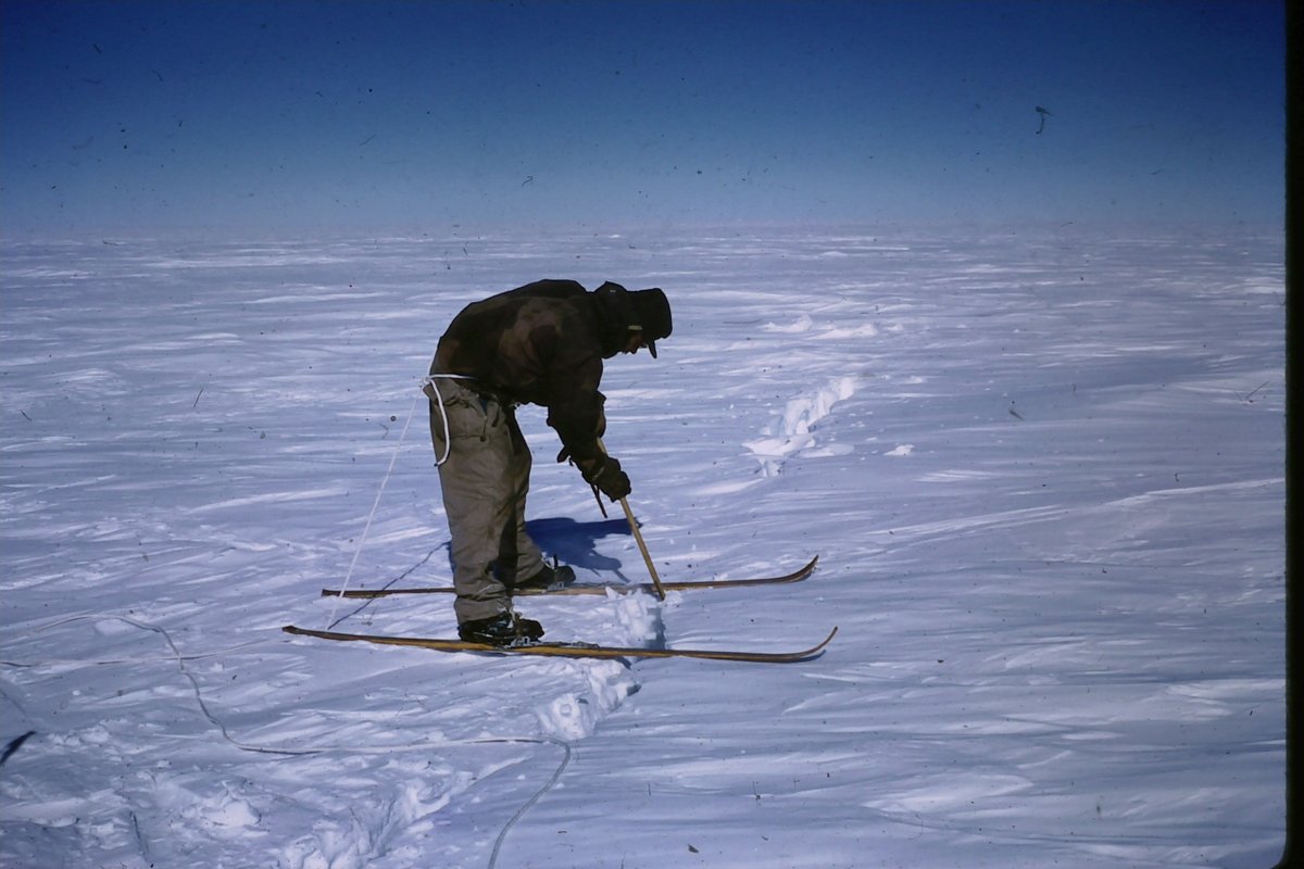 It'd make an OH&S officer's hair stand on end, but George says back in those days, things were different. Check out the safety equipment in this pic of George on skis over a crevasse. Is he poking it with a stick?