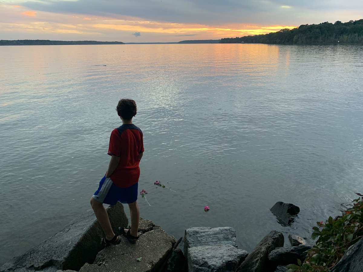 With us losing light fast, we placed the flowers in the Potomac in two groups. This was the first, with the children doing the honors. Everytime they threw a flower in the water, they said something about RBG. Like how she was kind or fought to make people’s lives better.