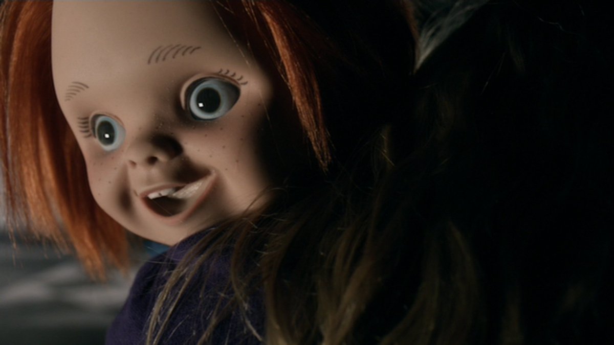 That's a weird reaction to getting hugged by a child, Chucky.Also close your damn mouth. That's unsightly.