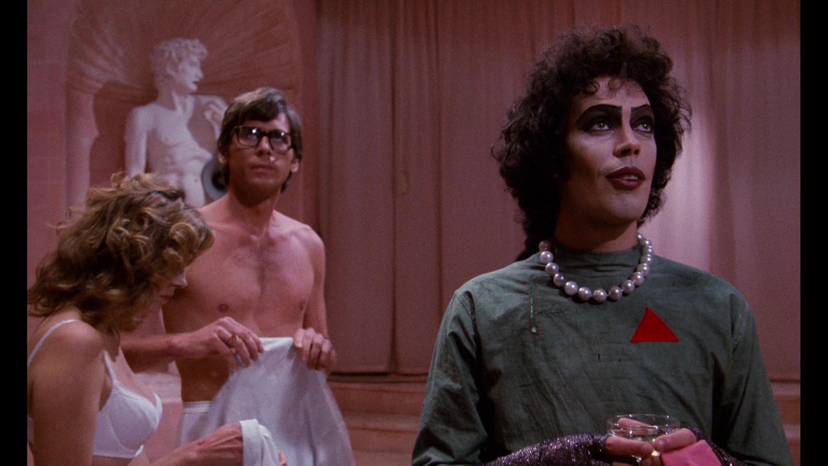 THE ROCKY HORROR PICTURE SHOW (1975) dir. Jim Sharmanmusical/comedy/sci-fi // sweethearts Jen & Brad find themselves stranded in the middle of a storm at the house of Dr. Frank-N-Furter, a mad scientist, who unveils his latest creation: a muscular man named Rocky.