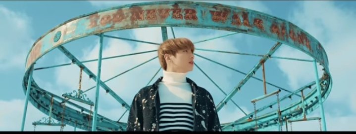 In the next scene, we see Jungkook and the Carousels. Carousels are a metaphor for innocence of youth.