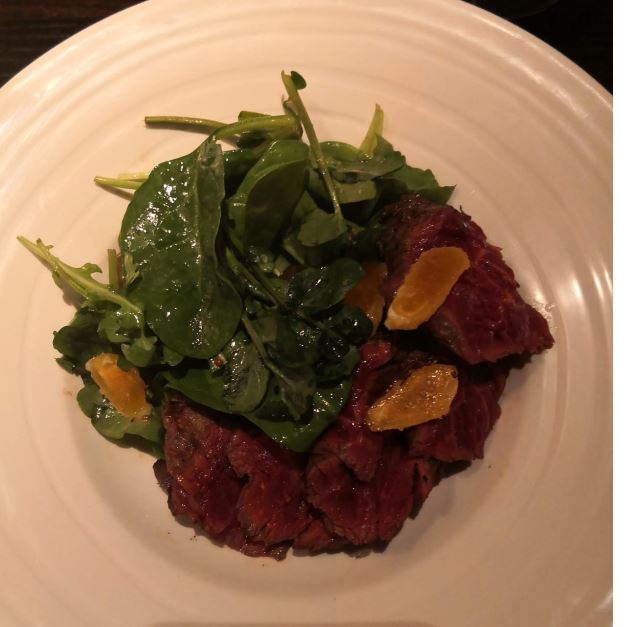 Take a look at one of our specially designed A la Carte Starters - Yorkshire Onglet Steak (served rare), Cured Egg Yolk, Roasted Balsamic Pearl Onion, Spinach Salad - it's so delicious and tasty - why not book in to try it #leedseating #frenchrestaurant