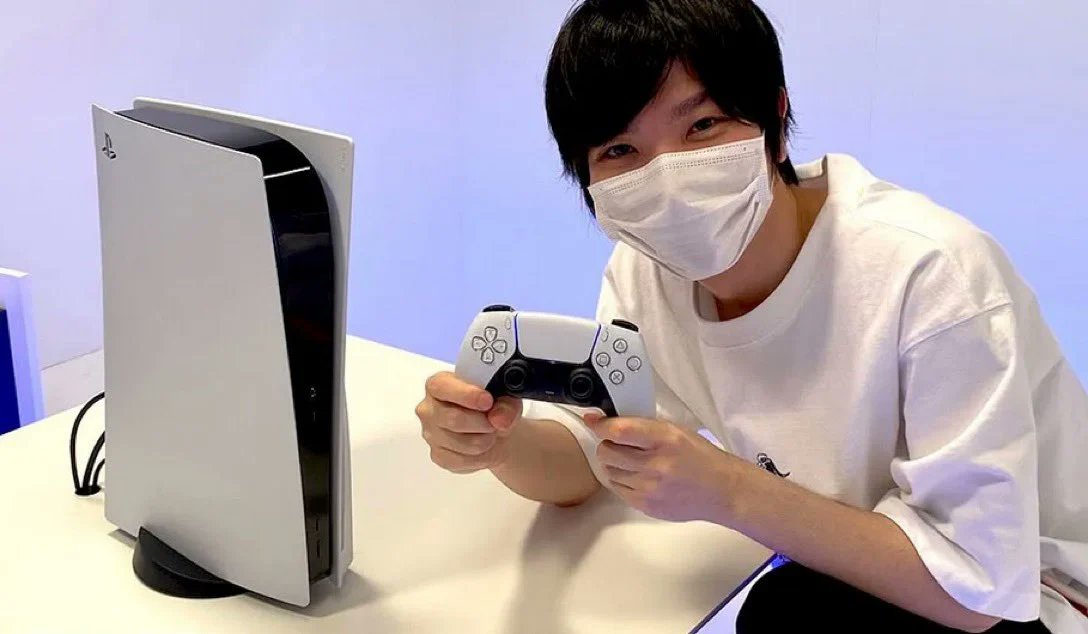 The PS5 is legitimately enormous.Remember: DualSense is larger than DualShock 4. Thus, just compare the size of the console to the controller in this picture of a Japanese YouTuber (and to the man himself).You're gonna need a fucking airplane hangar to house this thing. LOL.