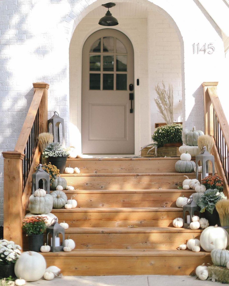 The key a festive front door? Classic pieces paired with seasonal accents. We love how @ lindsaytrabingdesigns layered her front porch with our Caleb Lanterns and perfectly placed pumpkins ✨bit.ly/3iGxFLH