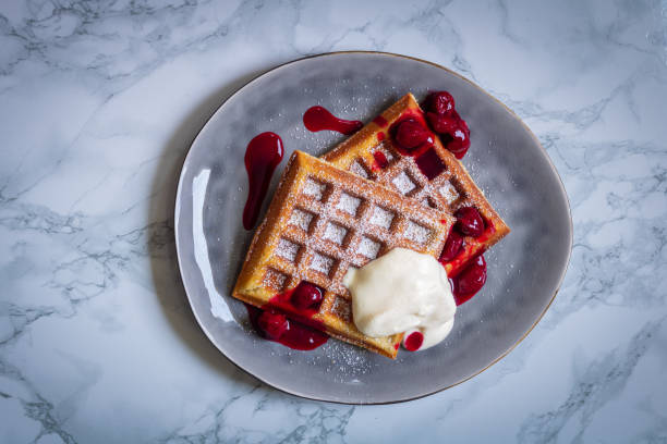 An American traveling in Brussels was the first to discover what are now known as Belgian waffles in 1964. This is when the Belgian waffle became a world wide legend!
