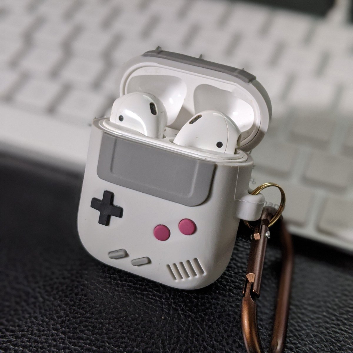 DevCollective__'s tweet photo. Check out our latest listing in the shop, our Gameboy Airpod cases! They come in both grey and black. For a limited time, they are 15% off! #gamergear  #gameboy  #airpodcases  #airpods #nerdgifts #gamergifts https://t.co/nW65iLoJ2S https://t.co/ZaDfnexdpJ