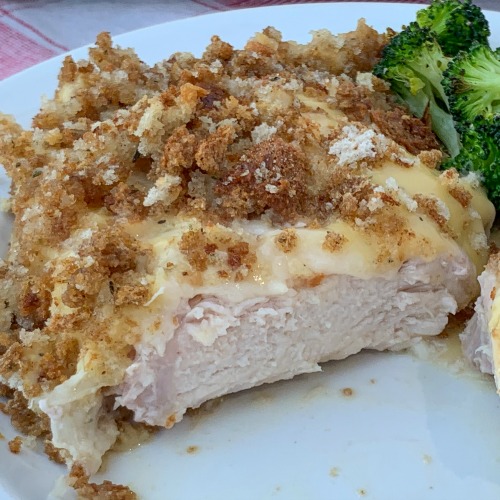Swiss cheese, white wine, cream of chicken soup and herb seasoned stuffing are sprinkled on pork chops to make the best Creamy Pork Chop Casserole recipe. #ad #WisconsinPork #USAPork plowingthroughlife.com/creamy-pork-ch…