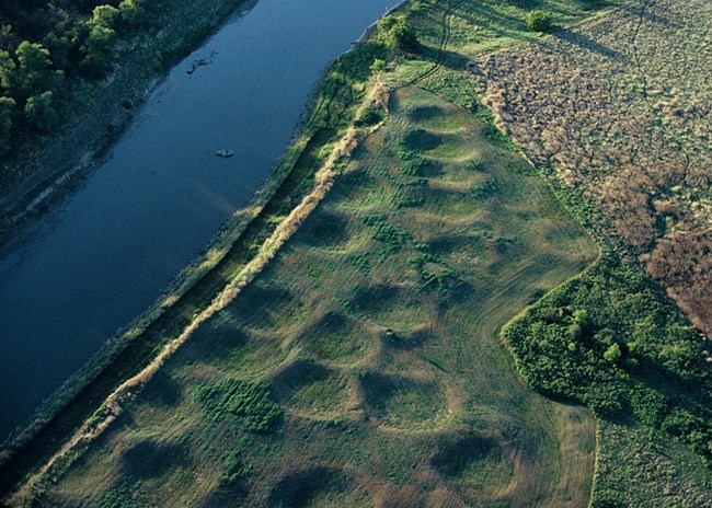 NPSArcheology's tweet photo. See what #archaeology found at Sakakawea Village (or Awatixa Village) in Central North Dakota, part of Knife River Indian Villages. (image: Awatixa Village) https://t.co/YNtEWqspIx #IAD2020 #FindYourPark https://t.co/kwqzE37lnZ