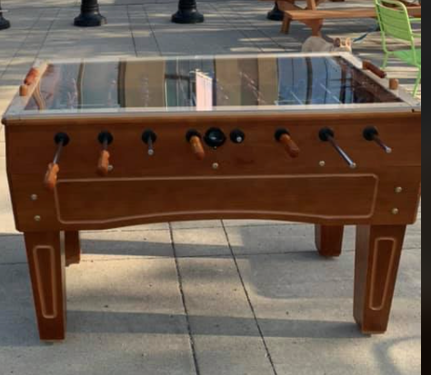 mcmillan_ali's tweet photo. Sadly I have to report someone stole the foosball table from the General Plaza in Bridgeland last night.  It was donated by a Roma's Pizzeria.  Would have taken two people and a truck to steal.  This is so pathetic. #Bridgeland If anyone saw anything!  Let @BRCAssociation  know.. https://t.co/DhZ3s9VFV9