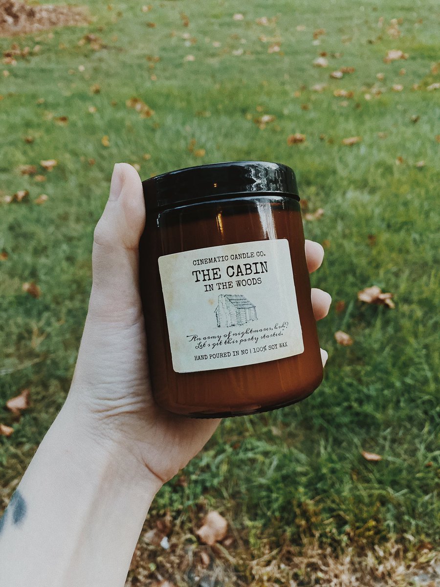 The Cabin in the Woods Scent: Cozy Cabin, a blend of fir needles, smoked woods, crisp forest greens, & warm spices. 