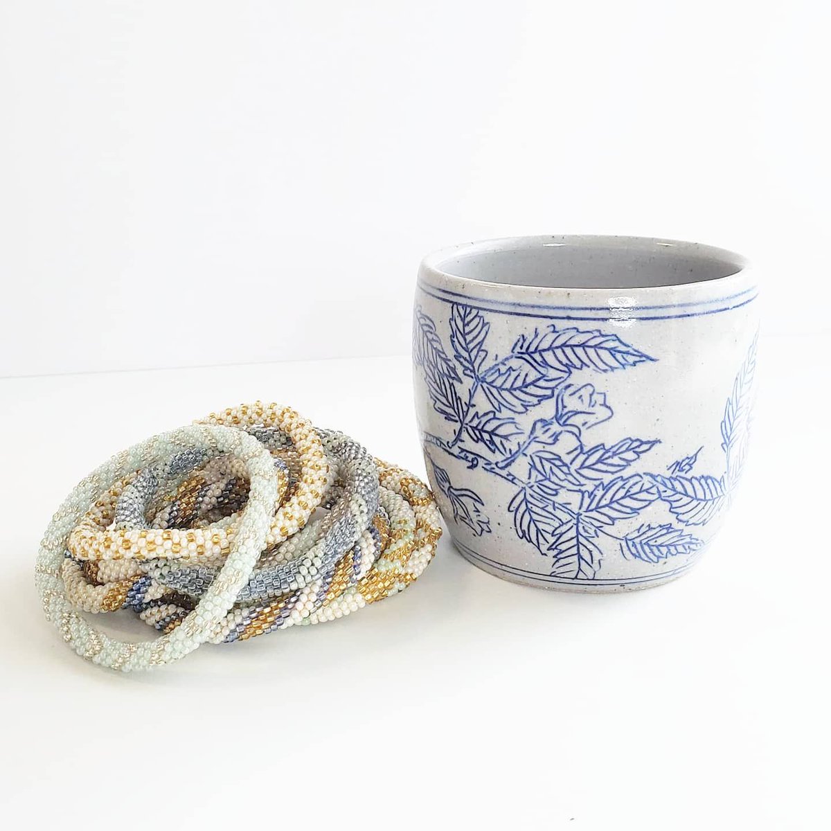 loreandlotus's tweet photo. Handmade is the best made. 💙 Don't you agree? 

We're loving these gorgeous handmade pottery cups and the lovely Roll-on Bracelets. 

#pottery #handmade #ethicallymade #madebyhand #artisanmade #consciousshopping https://t.co/3LA4xdBEYf