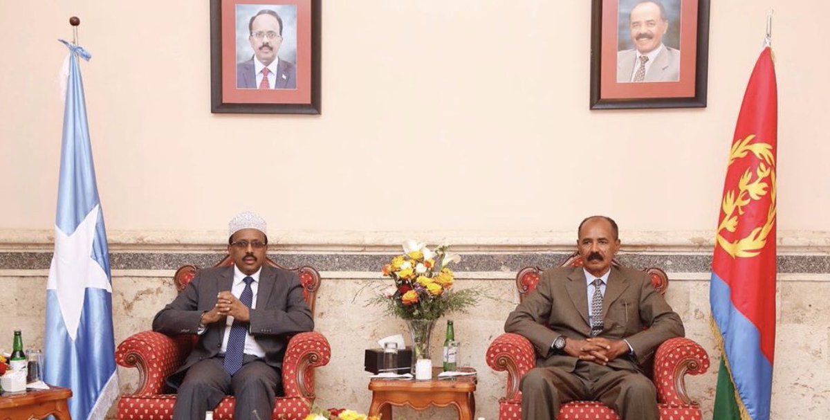 African presidents sitting under their portraits is the funniest flex ever.