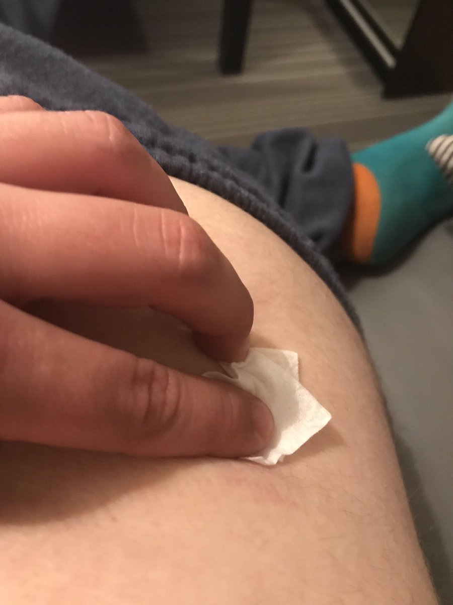 I identify the injection site and use an alcohol wipe to clean the area to reduce the chances of infection post injection.