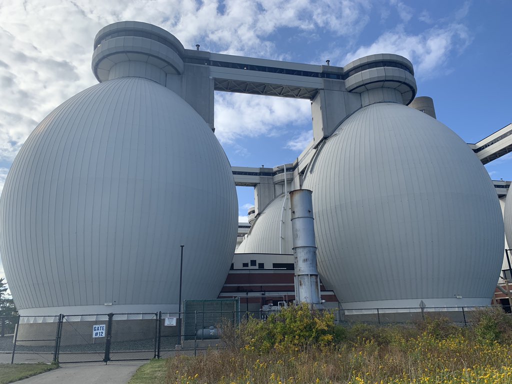 These characteristic 14 story tall egg shaped pods house microbes that break down and process 3 million gallons of sludge per day . The treated wastewater then is pumped 9.5 miles out into Massachusetts Bay, where the water quality is monitored constantly.