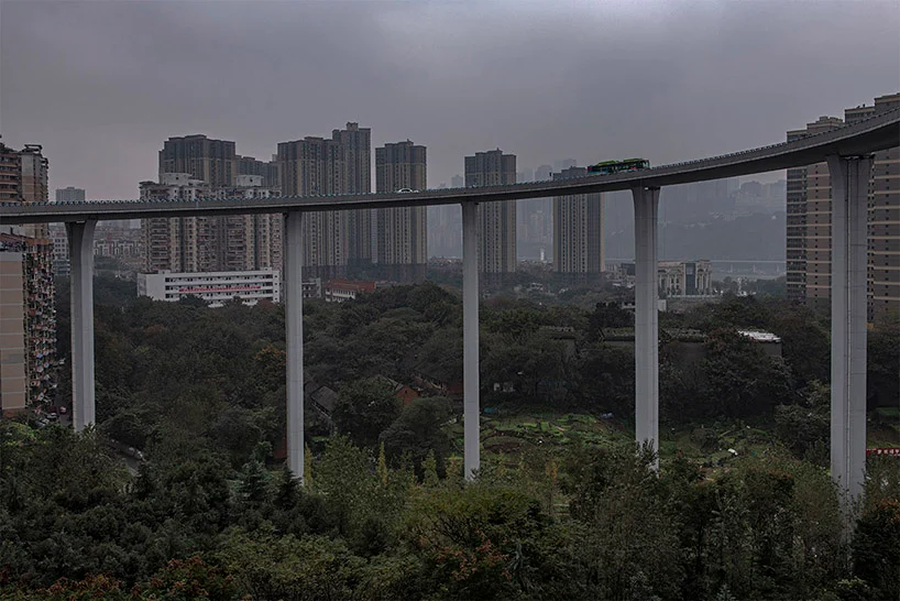 mixdevil66's tweet photo. #ManuelAlvarezDiestro photographs the #densest #city in #China. In #Chongqing, inhabitants move from place to place by using a complex infrastructure system, that features mega bridges, ramps, and cable cars. https://t.co/Z4GFii8JSv #photography https://t.co/O1jQNa7rqv