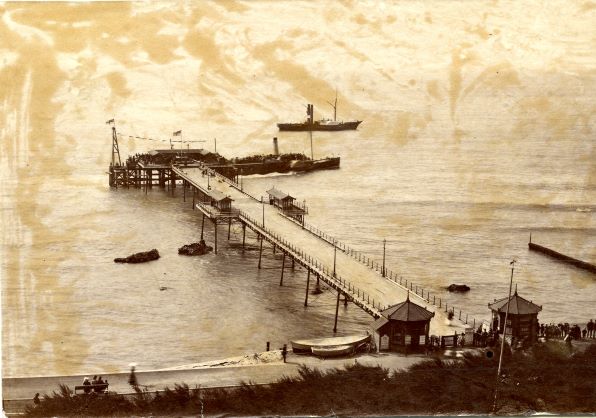 V is for Ventnor, Isle of Wight. Here are a couple of photos of the pier, we're guessing c. 1910 by the clothes. Steamer services stopped in 1914, so presumably they predate this. #ArchiveZ