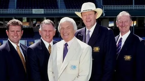 Benaud would typically be in white or cream or ivory or beige, while his colleagues often wore the darker shades.Of course, there were exceptions to this, as you will find on Google Images.+