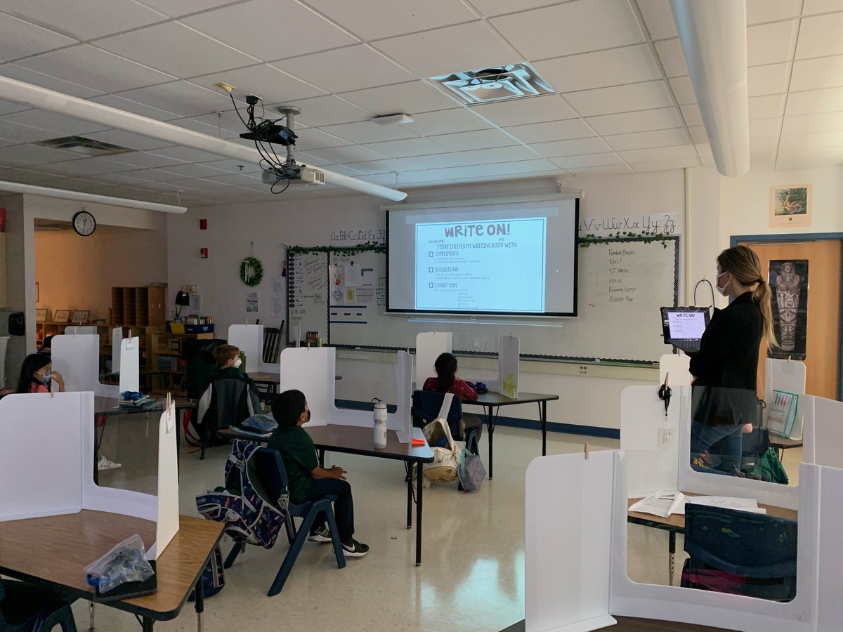 FXWChicago's tweet photo. In 3rd grade, we launched the writing lesson together via Zoom as one learning community—virtual and in person. Students learned what it meant to have a writing partner to peer-edit and grow as stronger writers. This is blended learning! #FXWAcademics #FXWExperience https://t.co/Htqiq5e6Xb