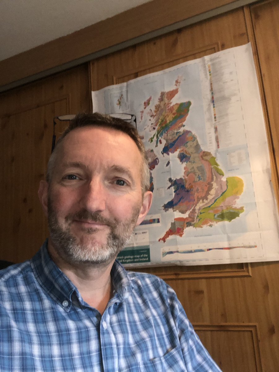 CliveBGS's tweet photo. Day 100: Working from Home #WFH in the Gedling branch of the @BritGeoSurvey - Day 1 was on Weds 18th March with lots of rocks in evidence - my home office is more organised and has a much more lived in look now (& a sliding Zoom background!) #BGSatHome #RockingRemotely #StaySafe https://t.co/OqpsguqKOB