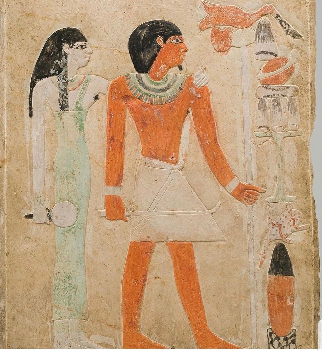 The tanned colour in ancient egypt, and to this day, was a symbol for strength, hardwork and exposure to the sunThat's why men exclusively were depicted by darker tones, as opposed to women, whose lighter tones were a symbol for welfare and not having to be exposed to the sun.